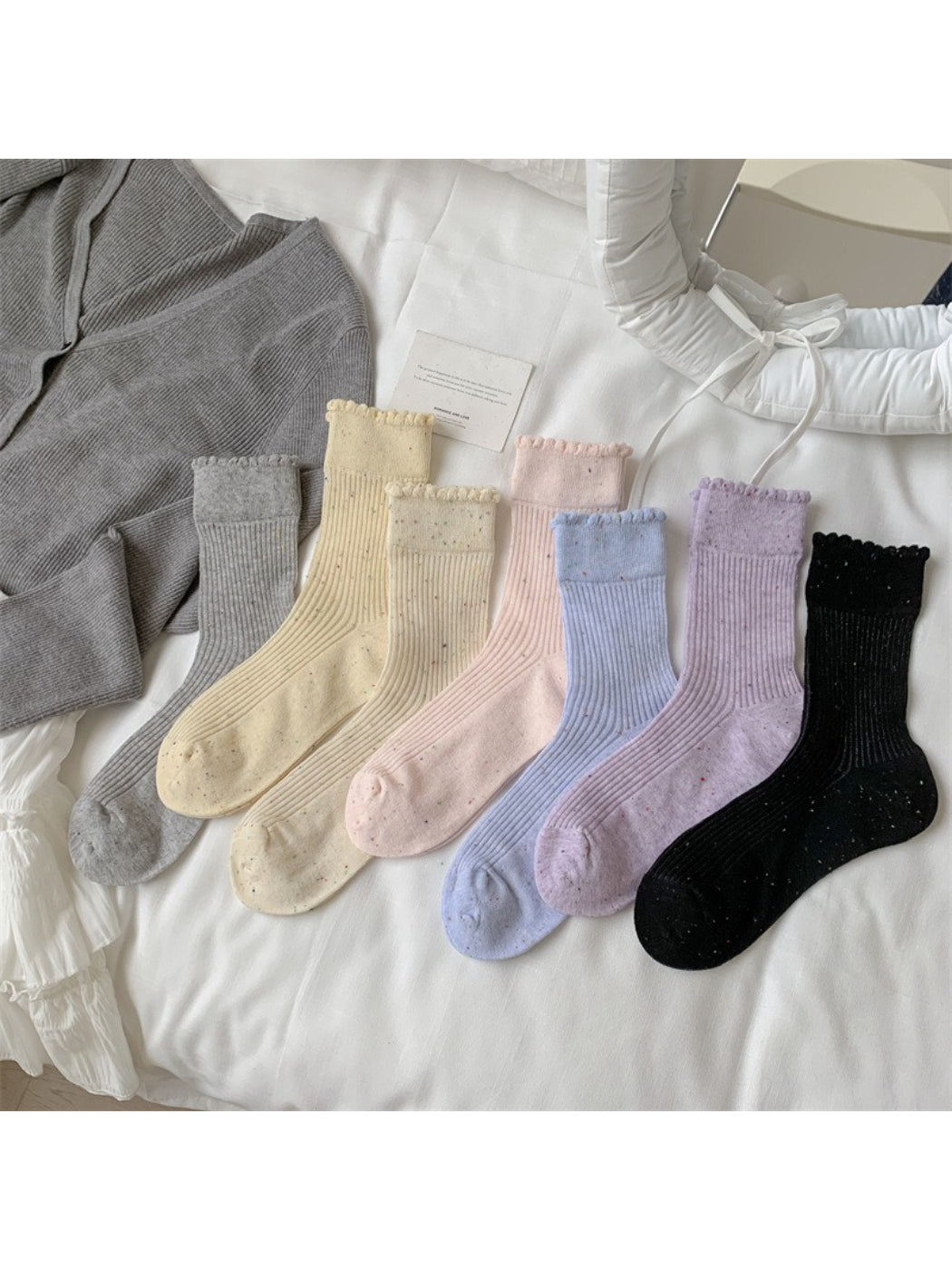 Model wearing Rufia rib crew socks with speckled knit texture and casual shoes