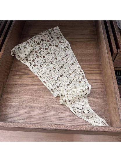 Side view of white crochet lace head scarf bandana tied at back
