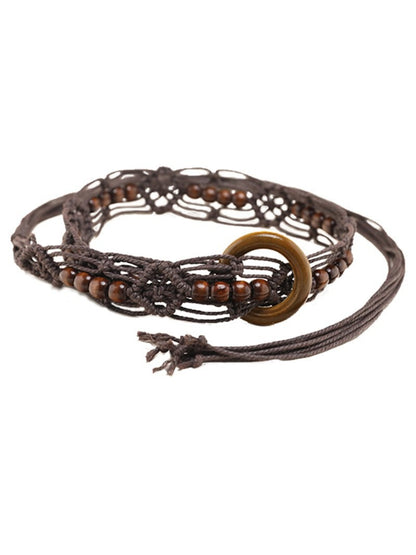 Side view of Beco Boho braided rope waist belt tied in a knot with wooden bead ends