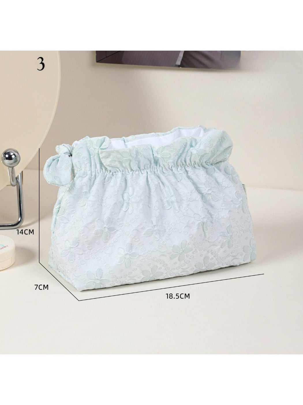 Close-up of Cosbai ruffle top floral cosmetic pouch showing fabric texture