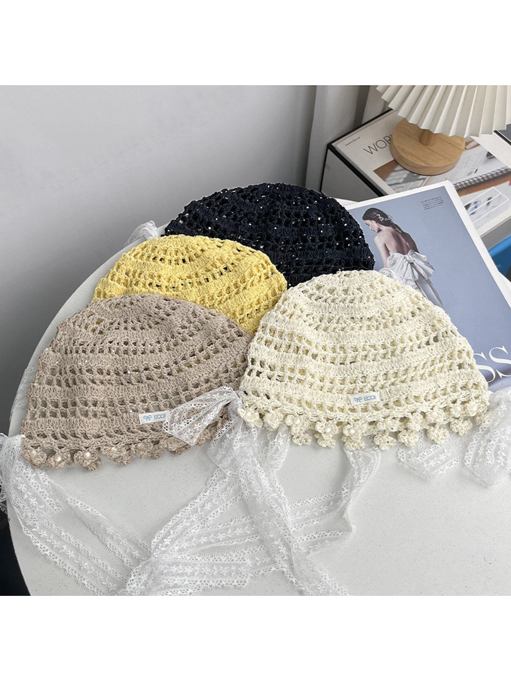 Haila - Bow Detail Hollow Knit Round Hat