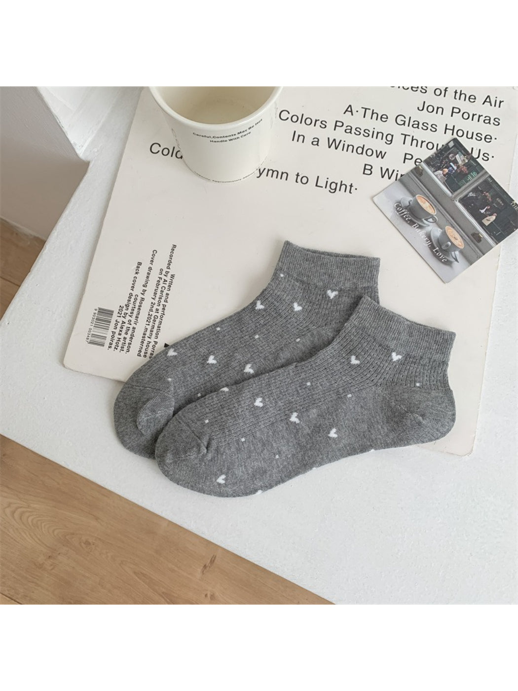 Side view of Rufia ankle sock highlighting heel and heart pattern design