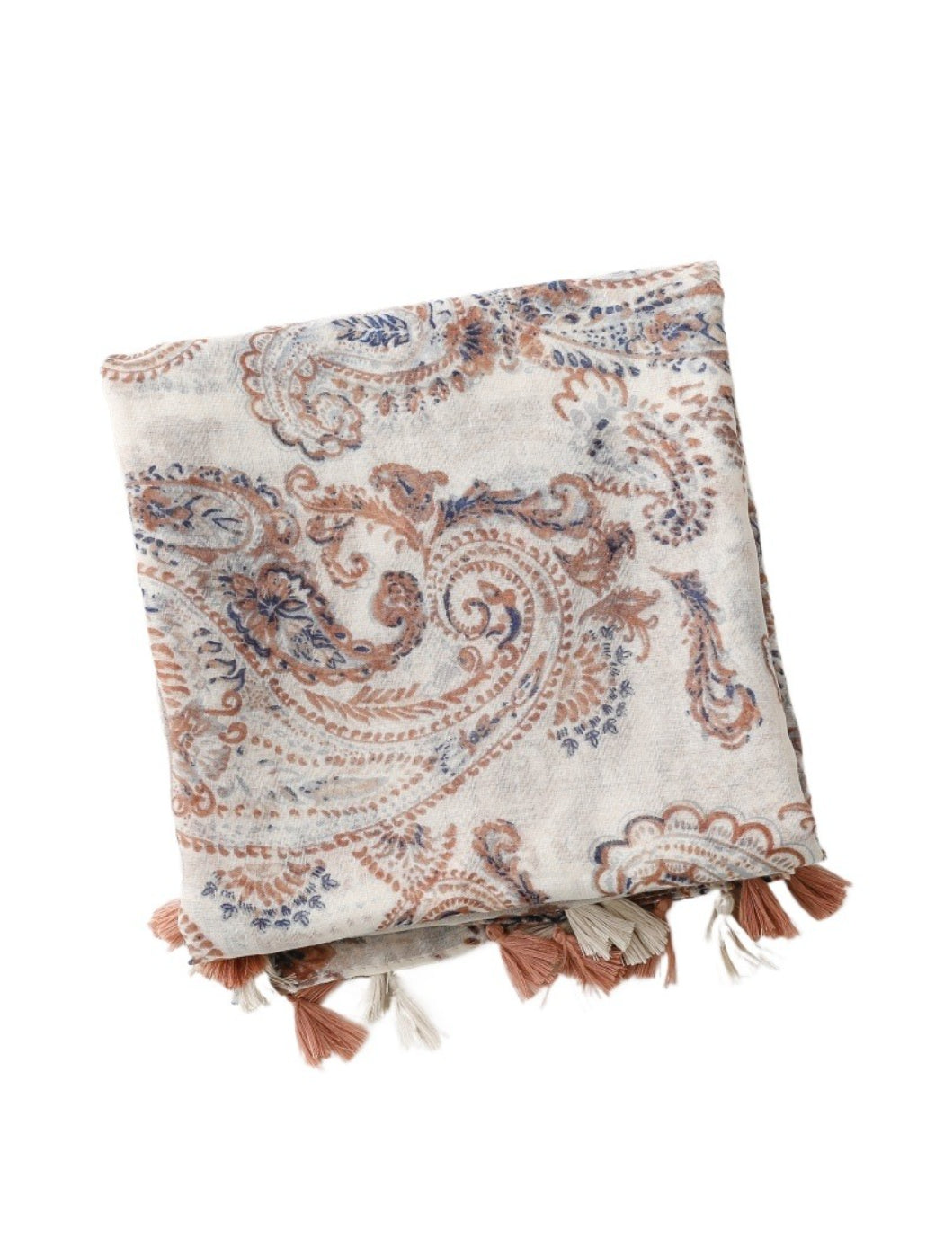 Close-up of colorful paisley pattern and tassel details on Scarvii shawl