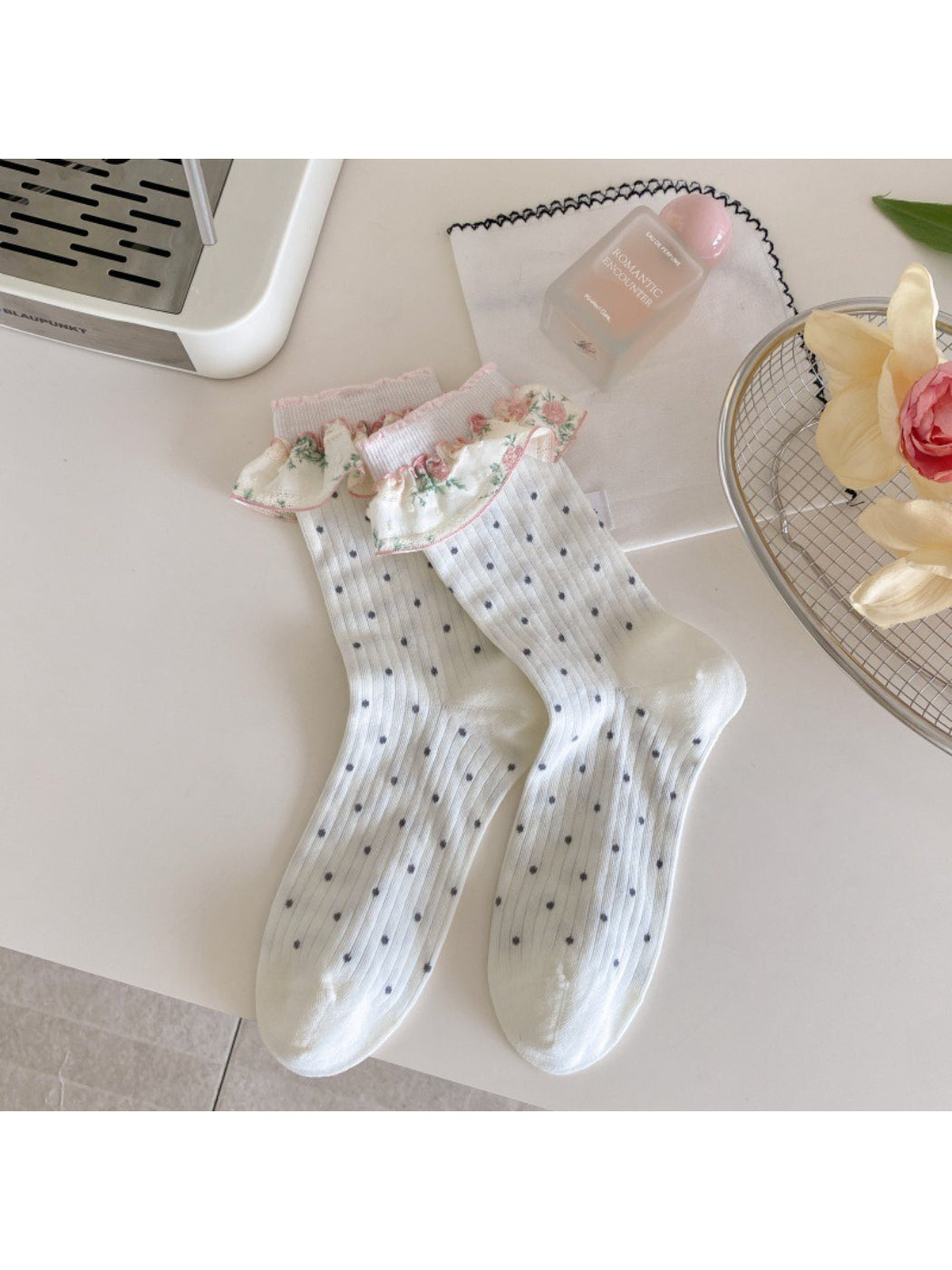 Rufia socks worn with casual shoes, highlighting comfortable fit and length