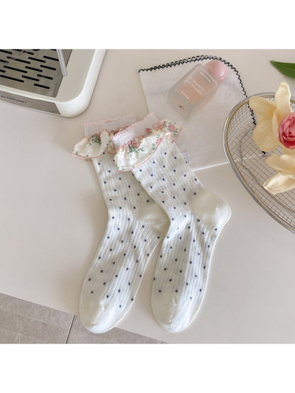 Rufia socks worn with casual shoes, highlighting comfortable fit and length
