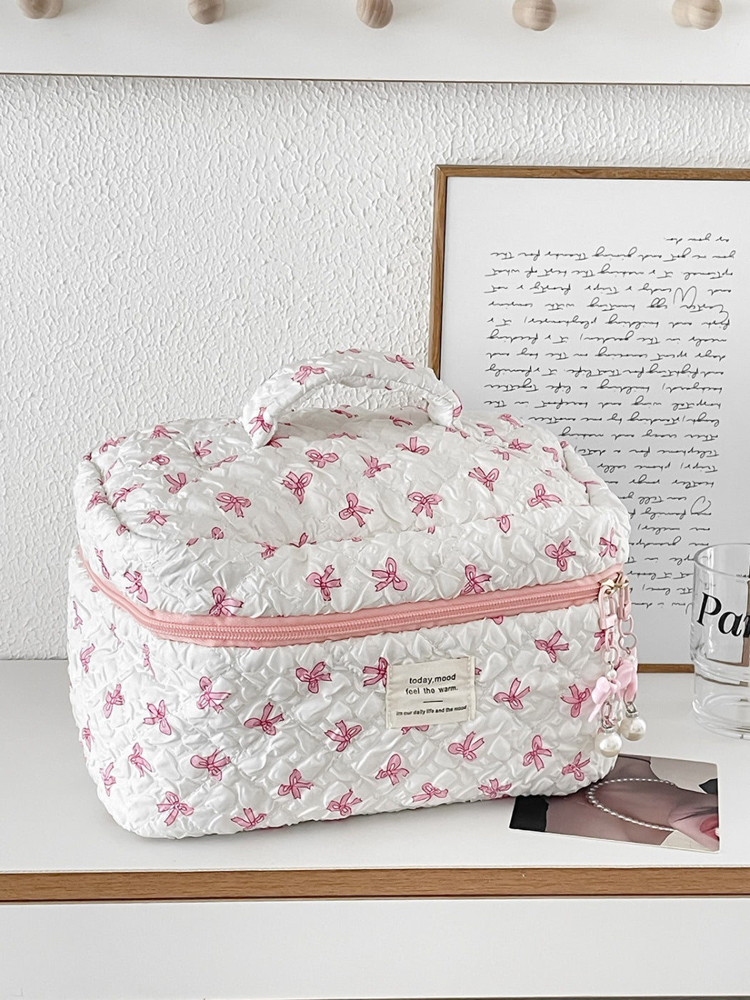 Cosbai travel makeup bag open displaying interior compartments and storage space