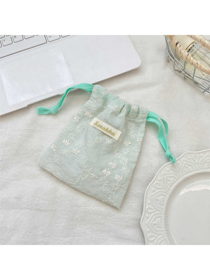 Cosbai floral lace drawstring pouch shown from side angle emphasizing lace details