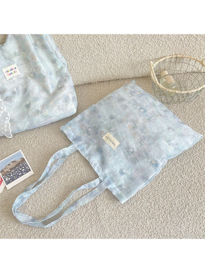 Cosbai pastel flower everyday tote bag hanging with visible flower pattern