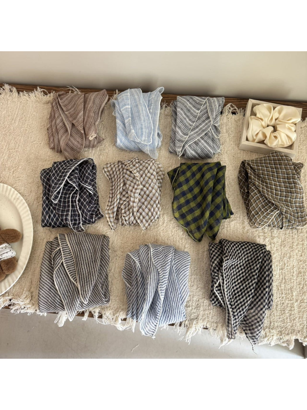 Casual striped bandana scarf folded on a white background