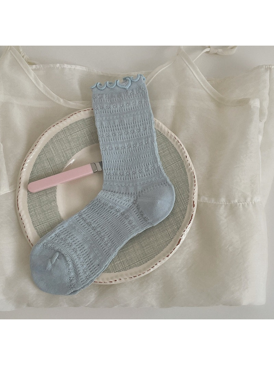 Rufia Sweet Ruffle Edge Socks displayed with matching pastel outfit