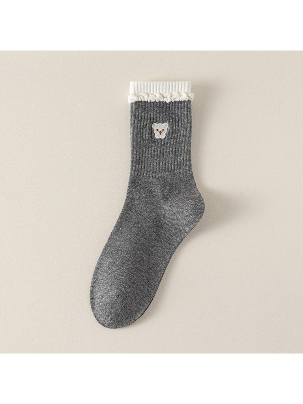 Close-up of Rufia socks showing soft teddy cuff and ribbed knit