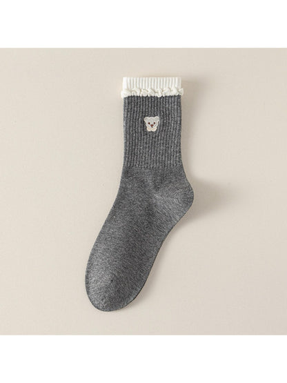 Close-up of Rufia socks showing soft teddy cuff and ribbed knit