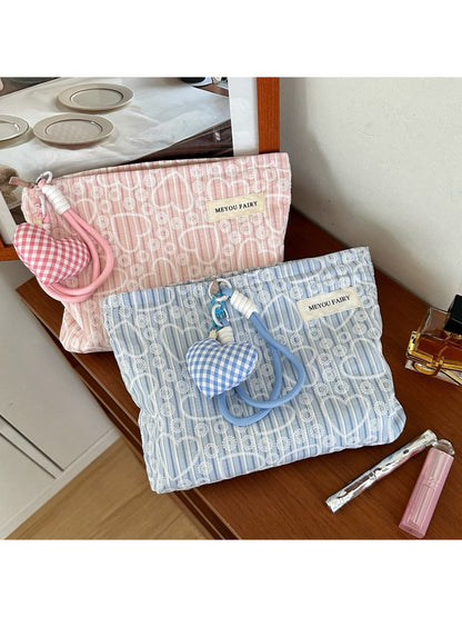 Cosbai cosmetic pouch with pink heart print and on white background