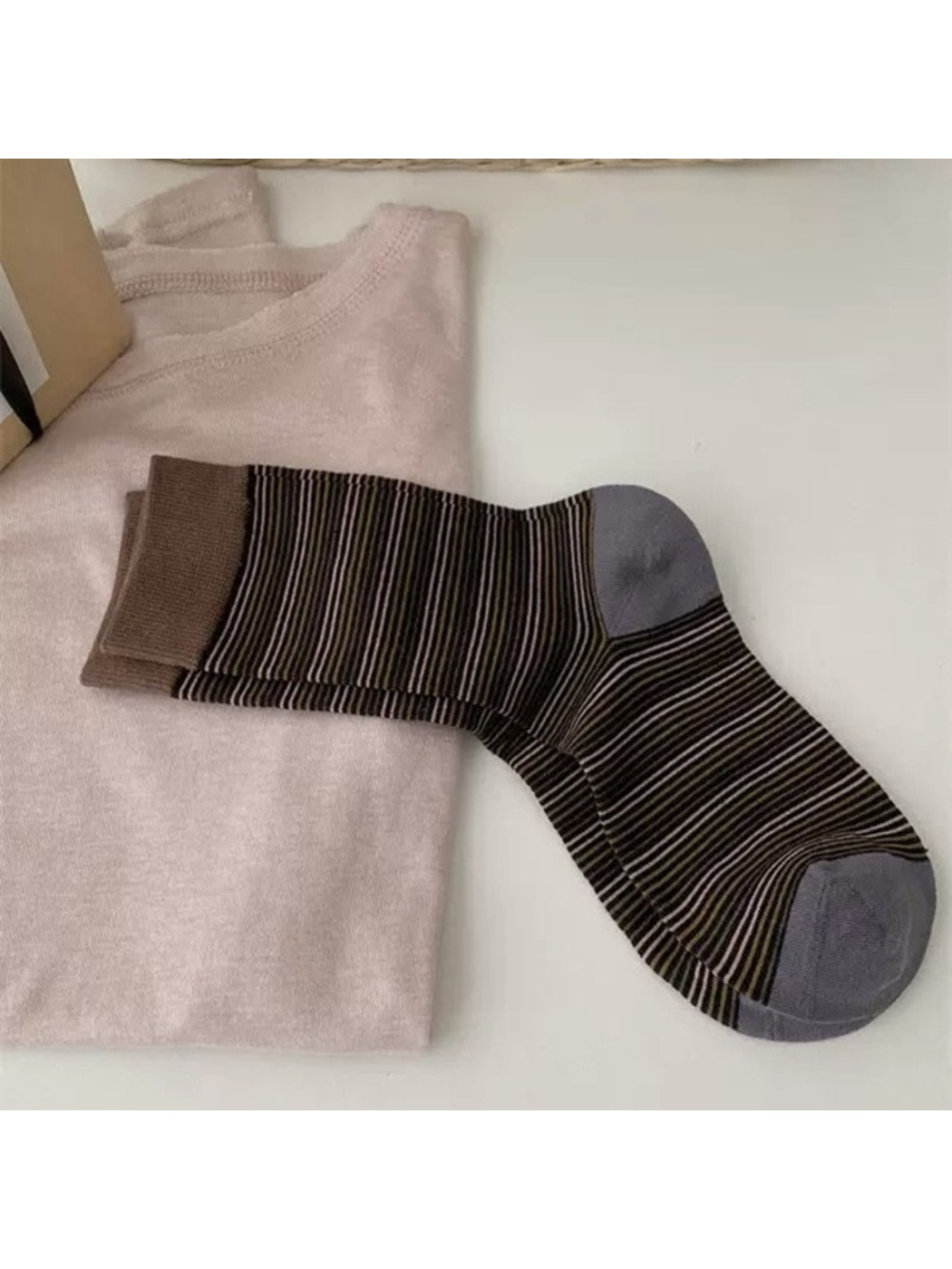 Model wearing Rufia Fine Stripe Everyday Crew Socks paired with rolled-up pants