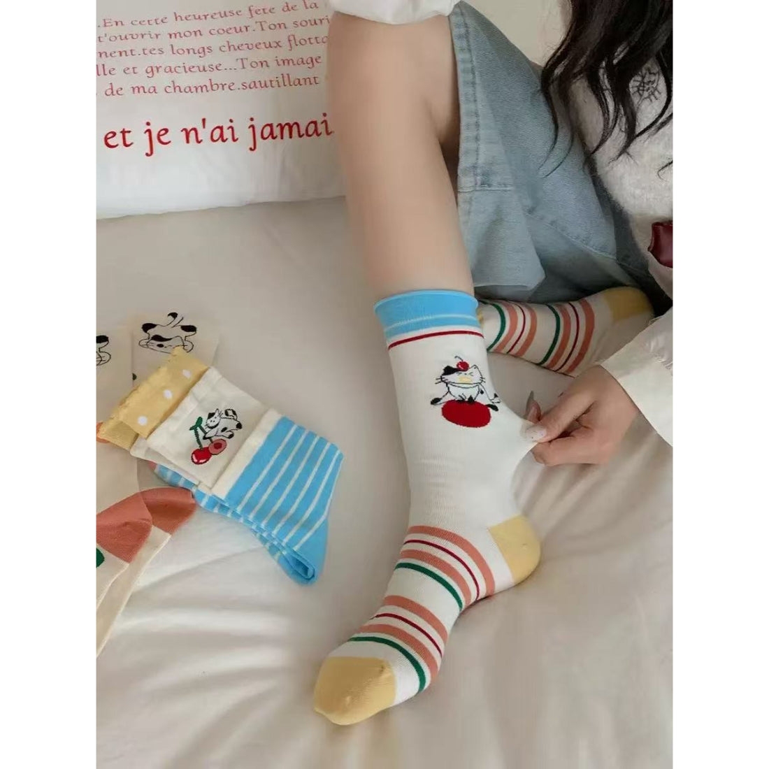 Rufia Dog Cat Stripe Crew Socks folded with visible dog and cat stripe details