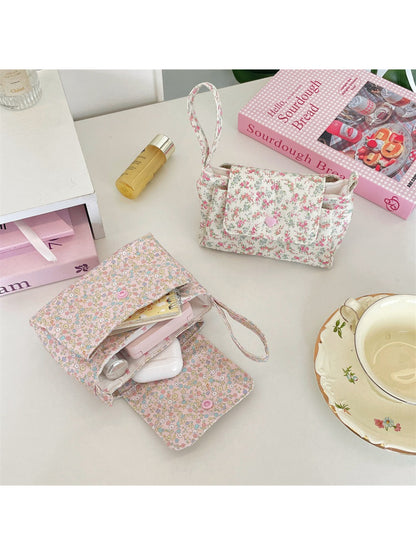 Back view of Cosbai Ditsy Floral Mini Handle Bag with floral design and zipper closure
