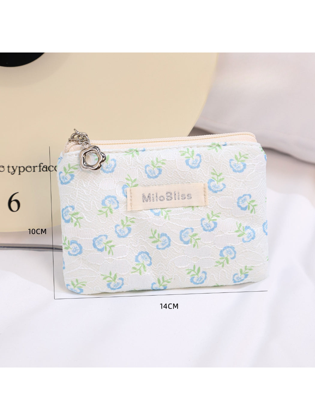 Cosbai floral coin purse with vibrant flowers in pink, yellow, and green tones