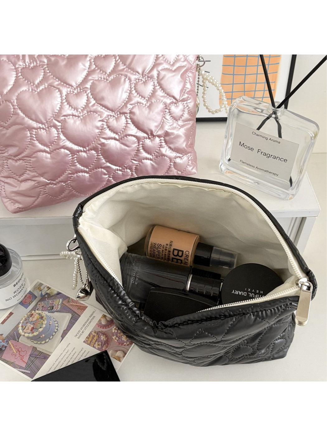 Close-up of Cosbai heart pattern zip cosmetic bag showing fabric texture