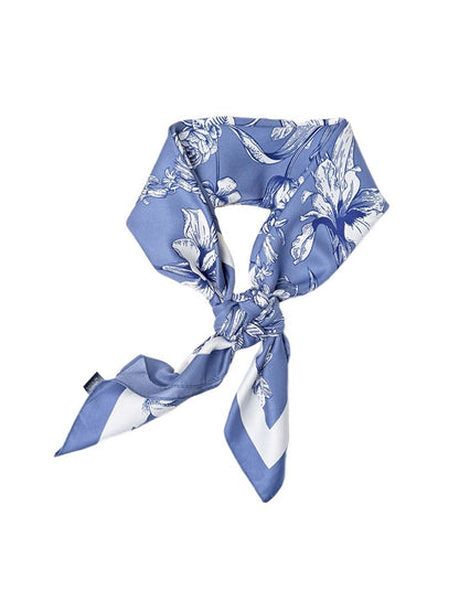 Scarvii square scarf folded to show vibrant floral design