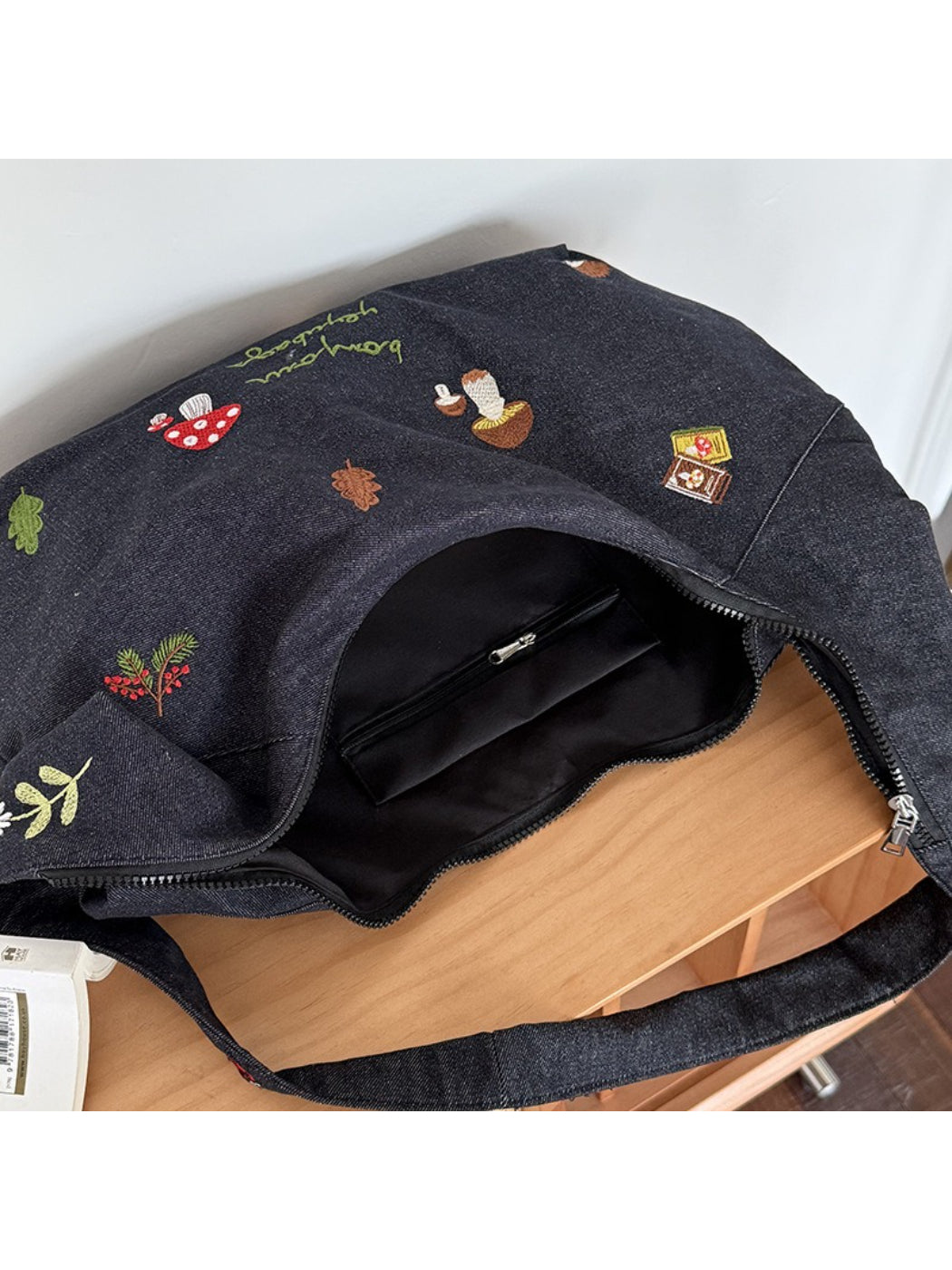 Side view of Cosbai Mushroom Stitch Shoulder Bag showing strap and stitching