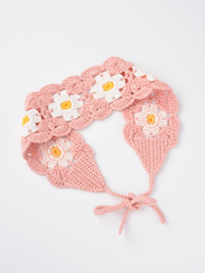 Side view of Haila crochet flower hairband with visible flower pattern