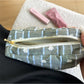 Close-up of Cosbai Soft Stripe Organizer Bag fabric with soft stripes