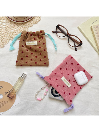 Close-up of velvet fabric texture on Cosbai polka dot drawstring pouch