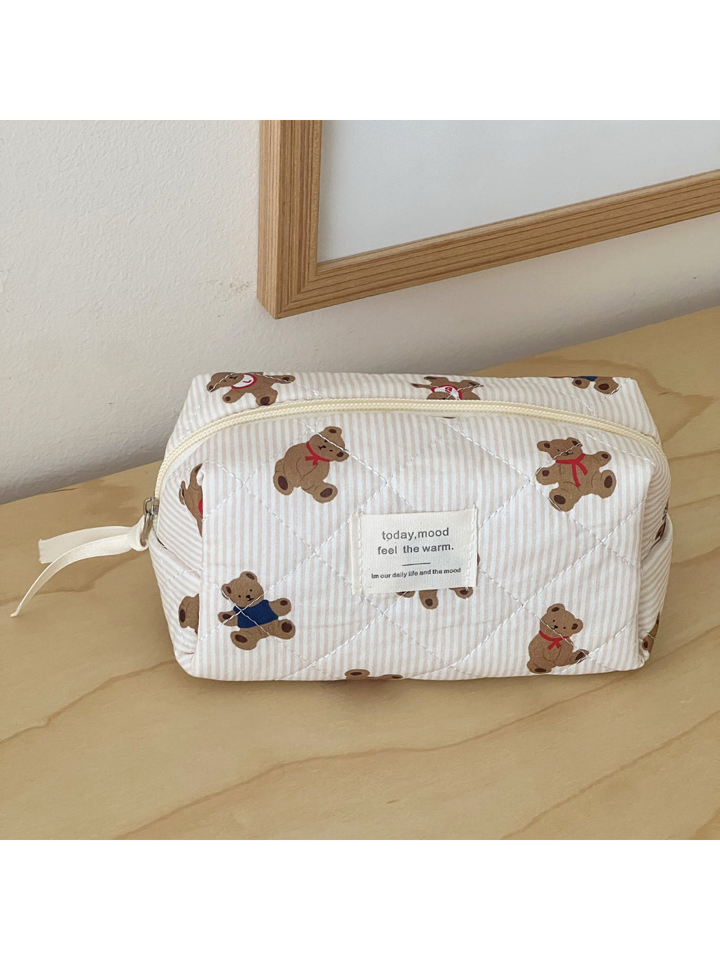 Cosbai bear cosmetic pouch open showing interior storage space