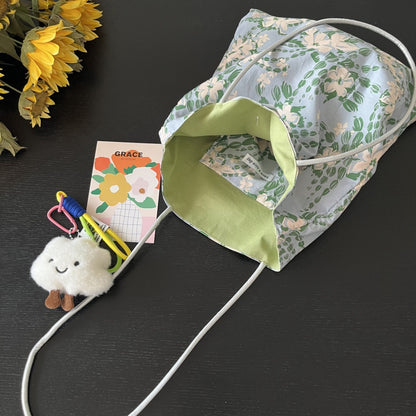 Cosbai Soft Bloom tote bag placed on wooden surface with natural lighting