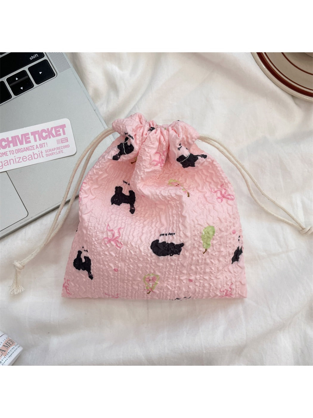 Cosbai cartoon drawstring pouch shown from side angle highlighting shape