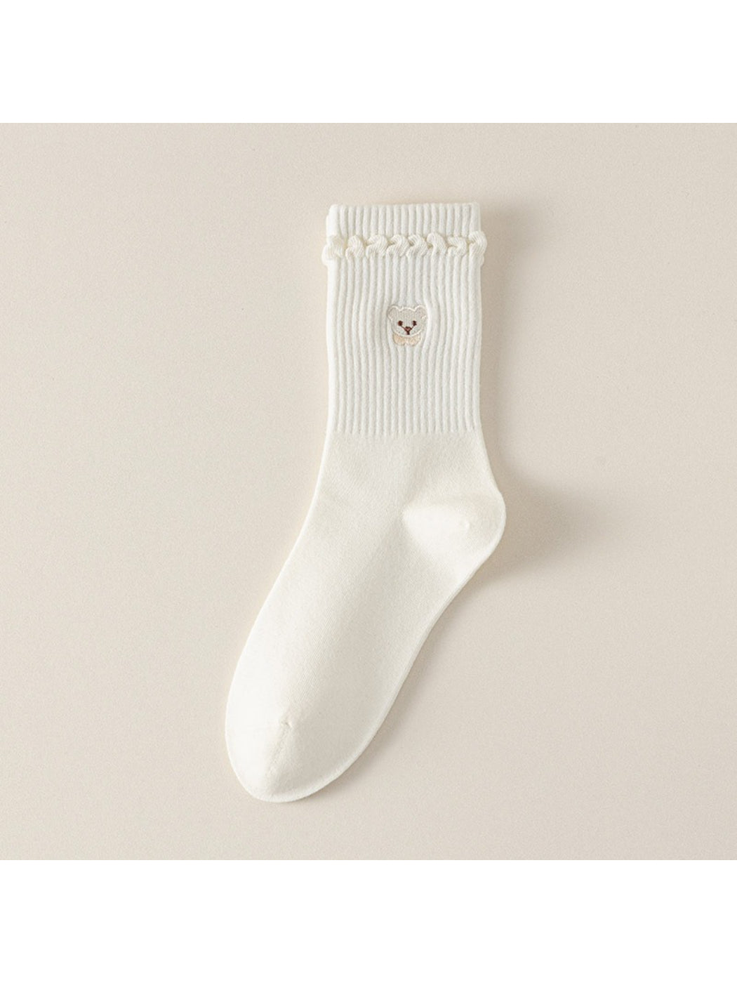 Model wearing Rufia soft teddy detail ribbed socks with casual shoes