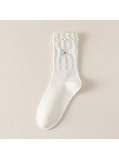 Model wearing Rufia soft teddy detail ribbed socks with casual shoes