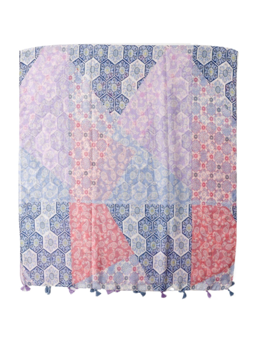 Model wearing pastel patchwork tassel scarf styled with a white top
