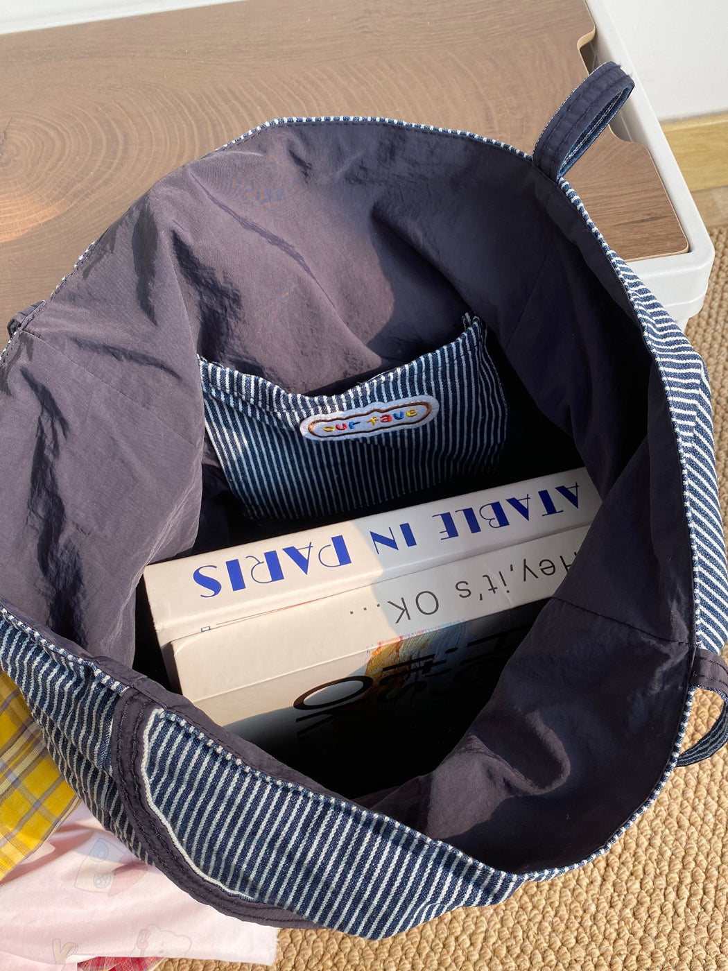 Cosbai striped reversible tote bag folded for compact storage