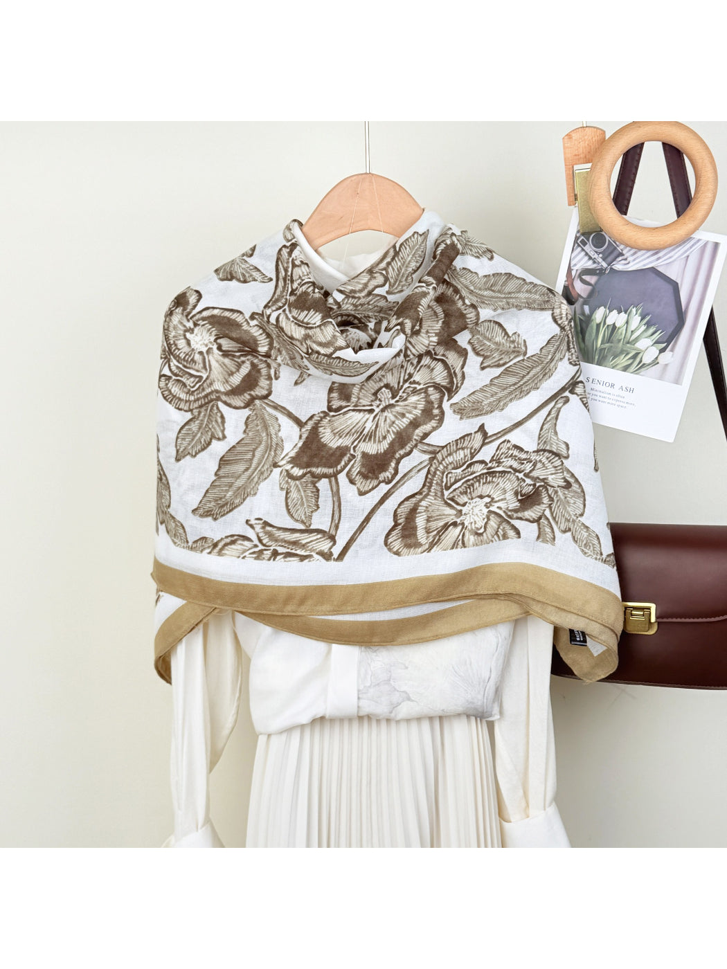 Scarvii wrap scarf with colorful floral illustration on light background