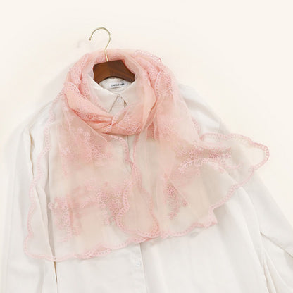 Scarvii scarf folded to highlight embroidered baroque patterns on sheer material