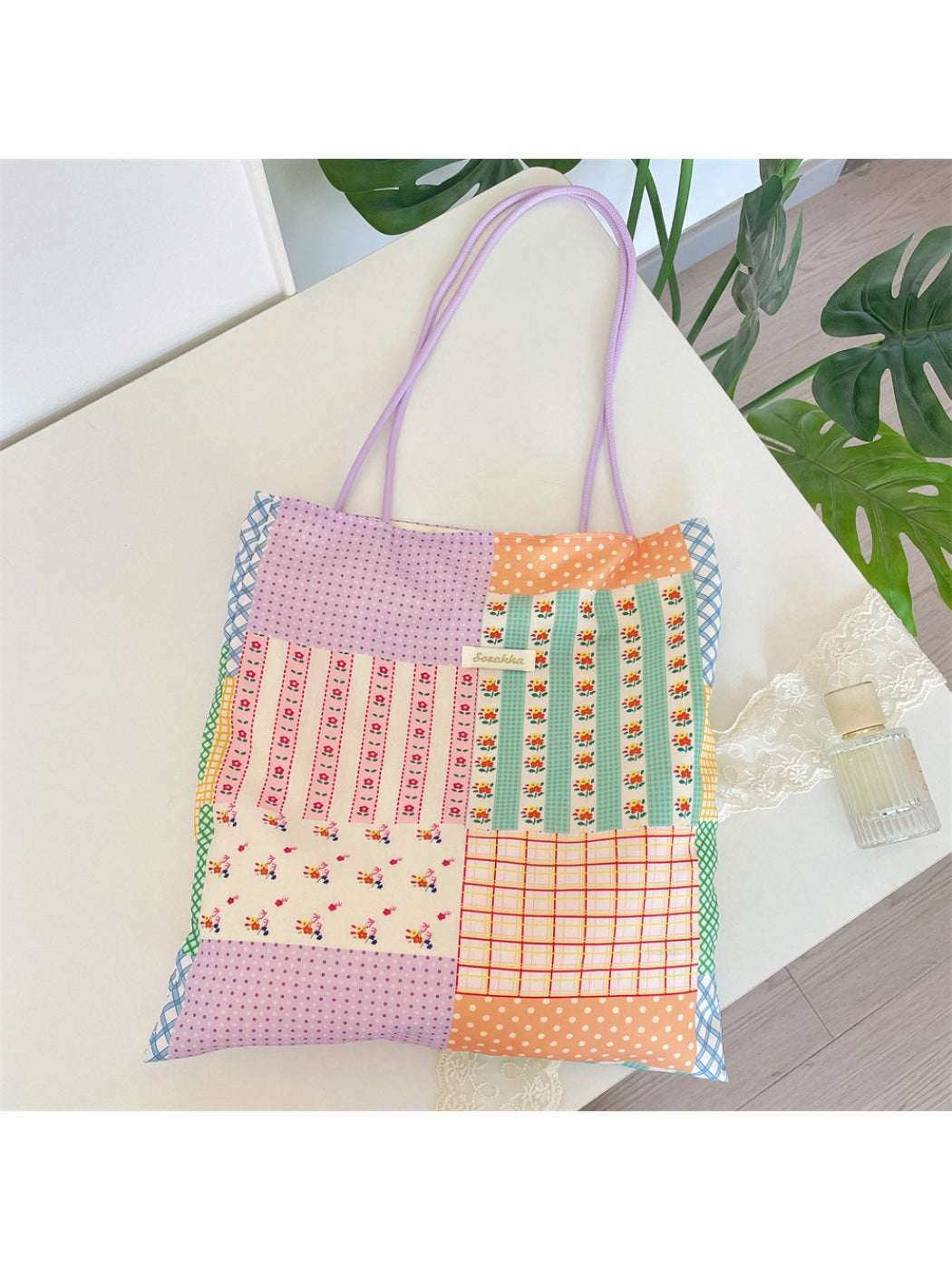 Cosbai pastel patchwork shopper tote bag with multicolor fabric panels and tan handles
