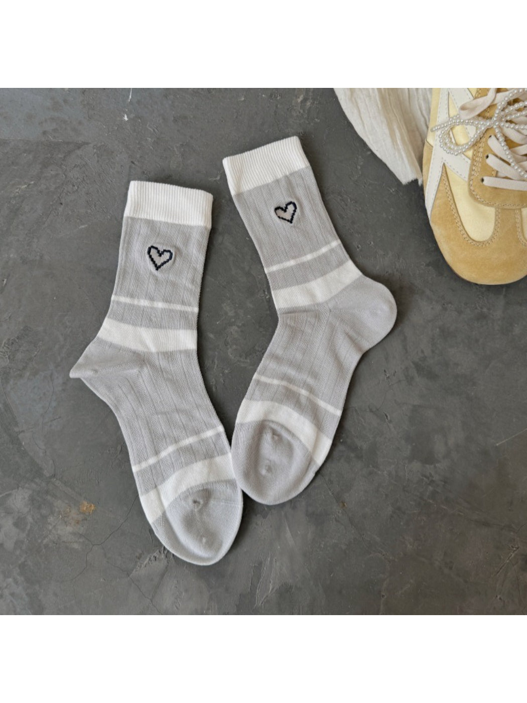 Rufia socks folded to show heart design and soft texture