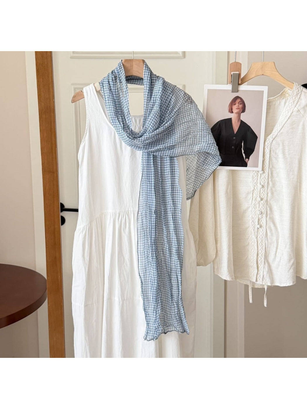 Soft gingham long scarf in black and white check pattern displayed flat