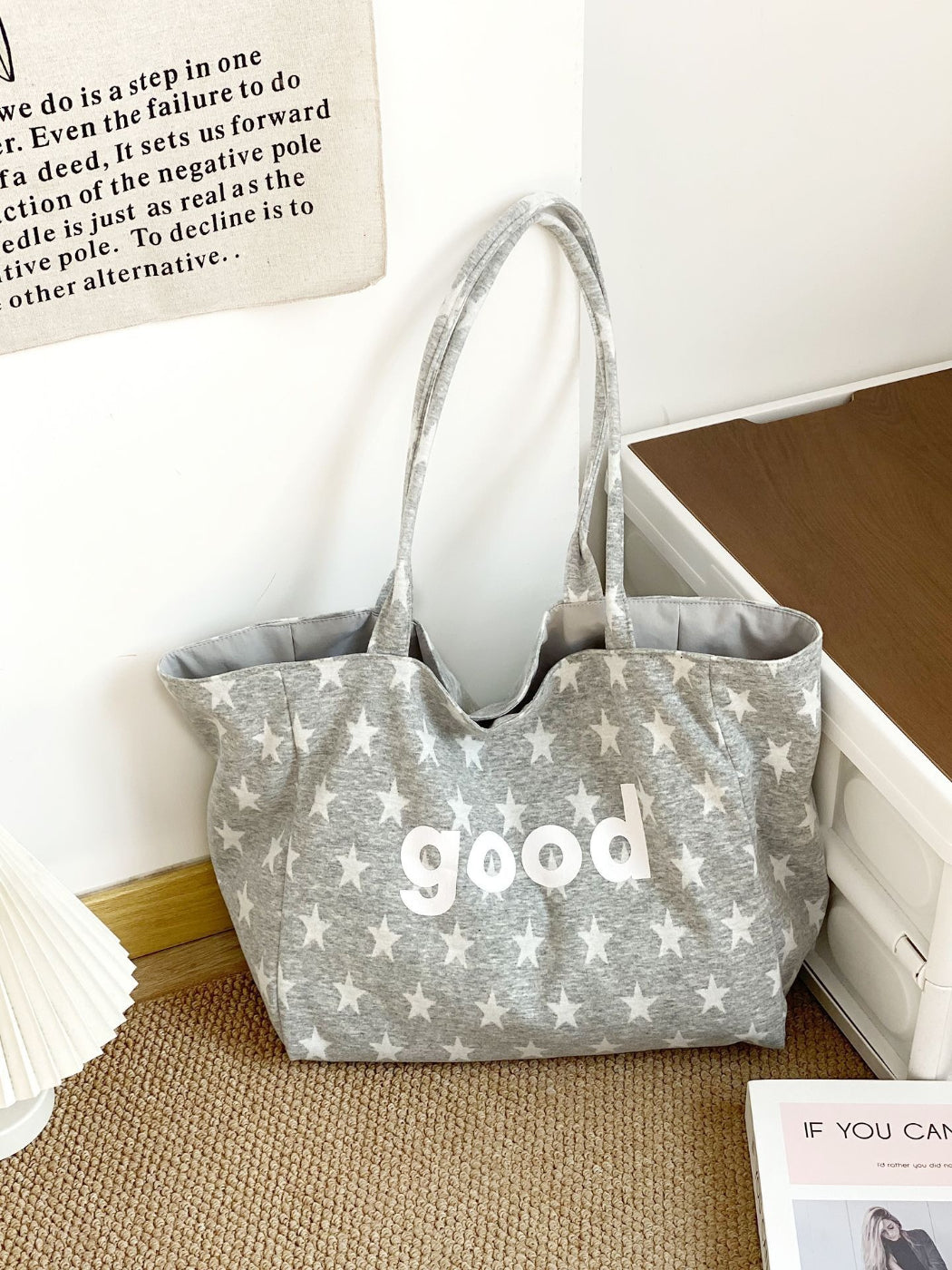 Close-up of star pattern detail on Cosbai graphic tote bag