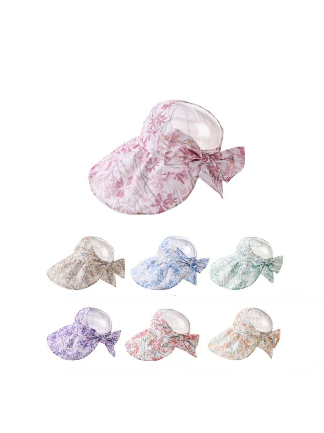 Pastel bloom wide brim hat with soft pink and blue floral pattern on white background