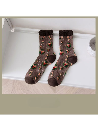 Rufia vintage rose floral crew socks displayed with packaging and branding