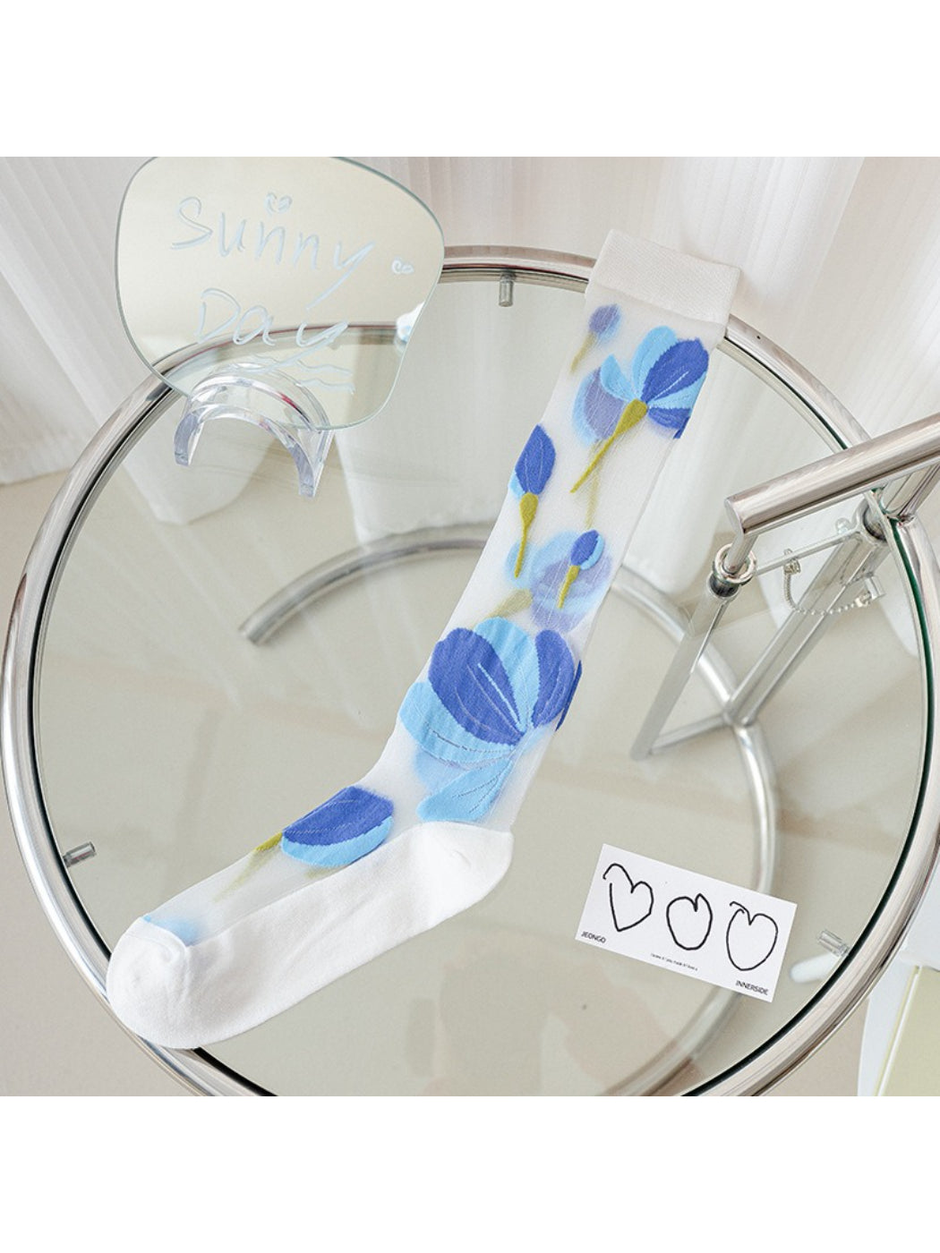 Rufia Bloom mesh knee high socks styled with casual outfit on model