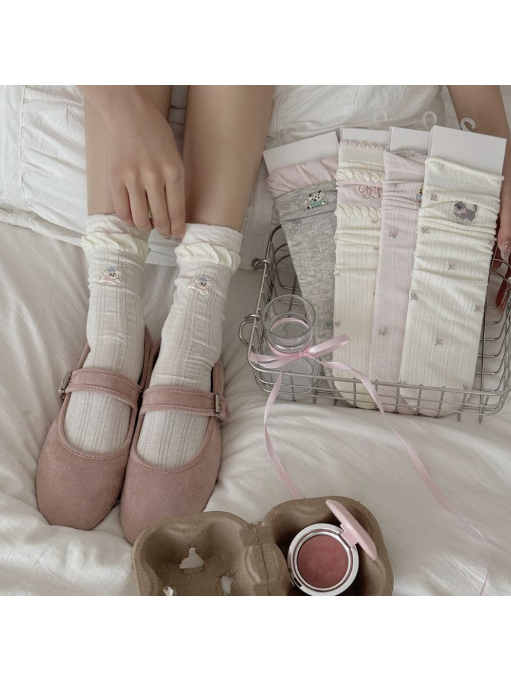 Pair of Rufia Sweet Animal Detail Crew Socks with colorful animal patterns on white background