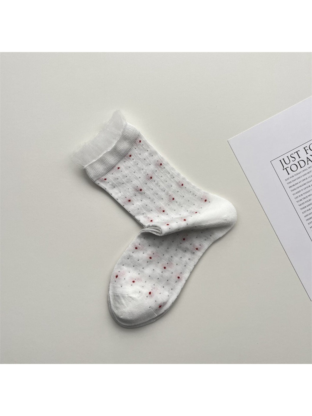 Rufia lace white mid-calf socks arranged to show full length and lace texture