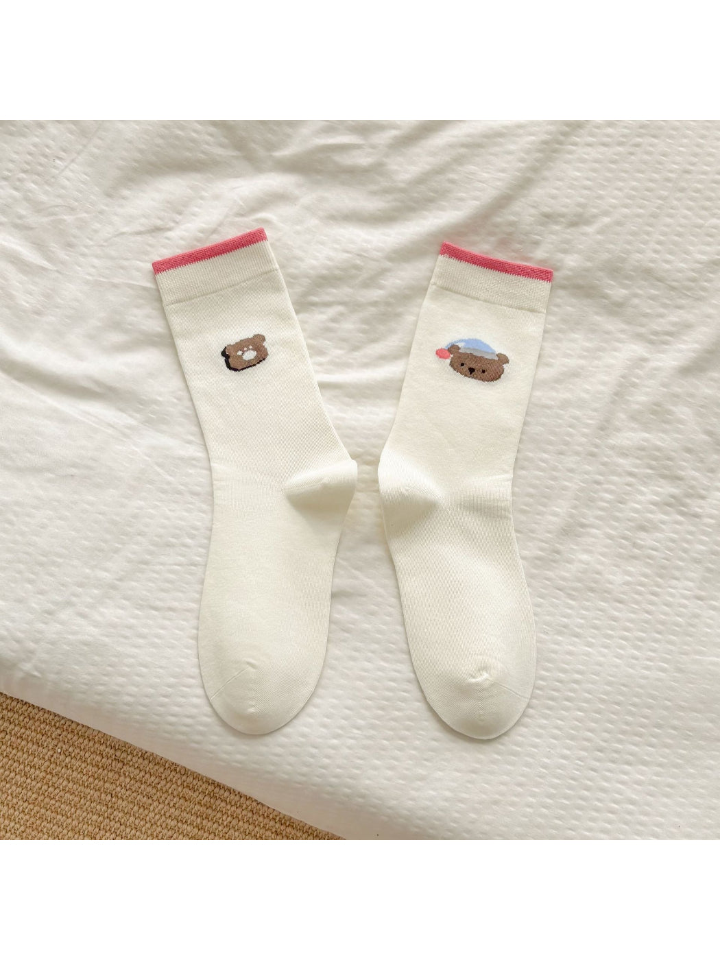 Rufia soft crew socks folded to display the bear motif and soft knit texture