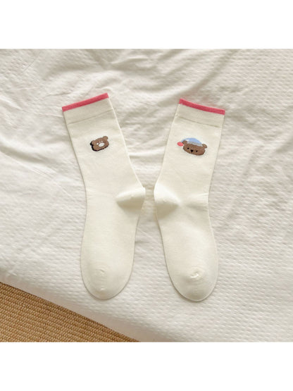 Rufia soft crew socks folded to display the bear motif and soft knit texture