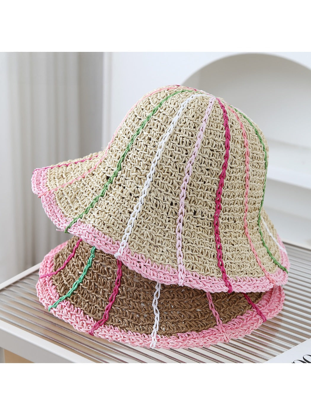 Haila Color Stitch Woven Bucket Hat shown from front angle with visible colorful stitching