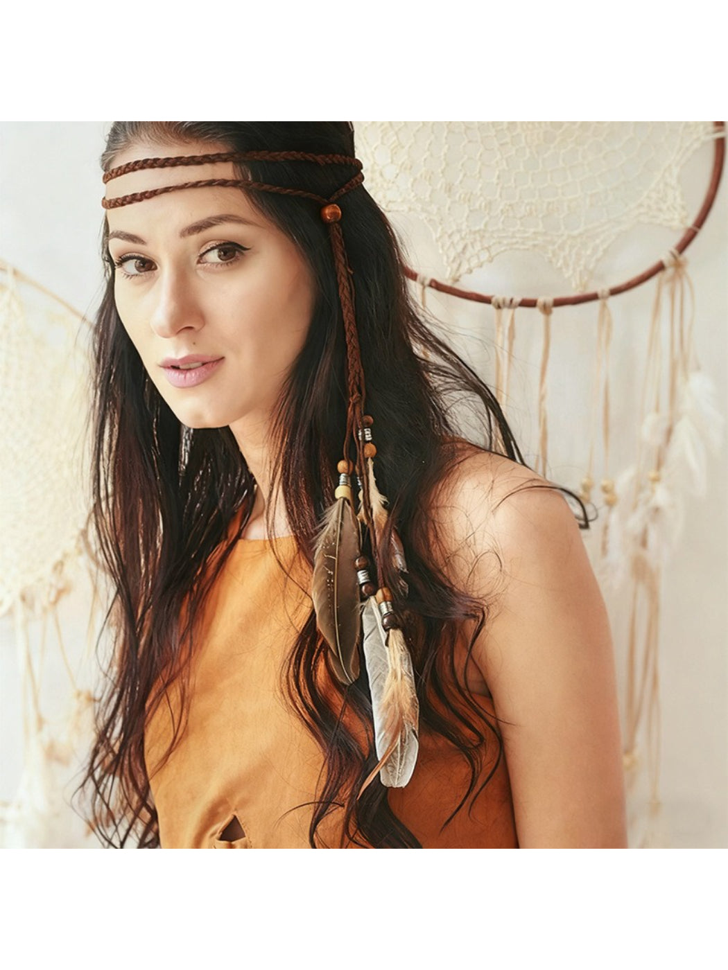 Side view of Hairish boho feather hair headpiece worn by a model