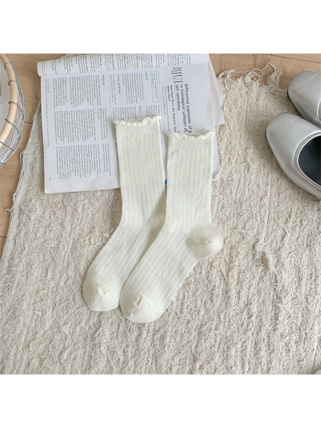 Side view of Rufia crew socks highlighting the frill trim and soft texture